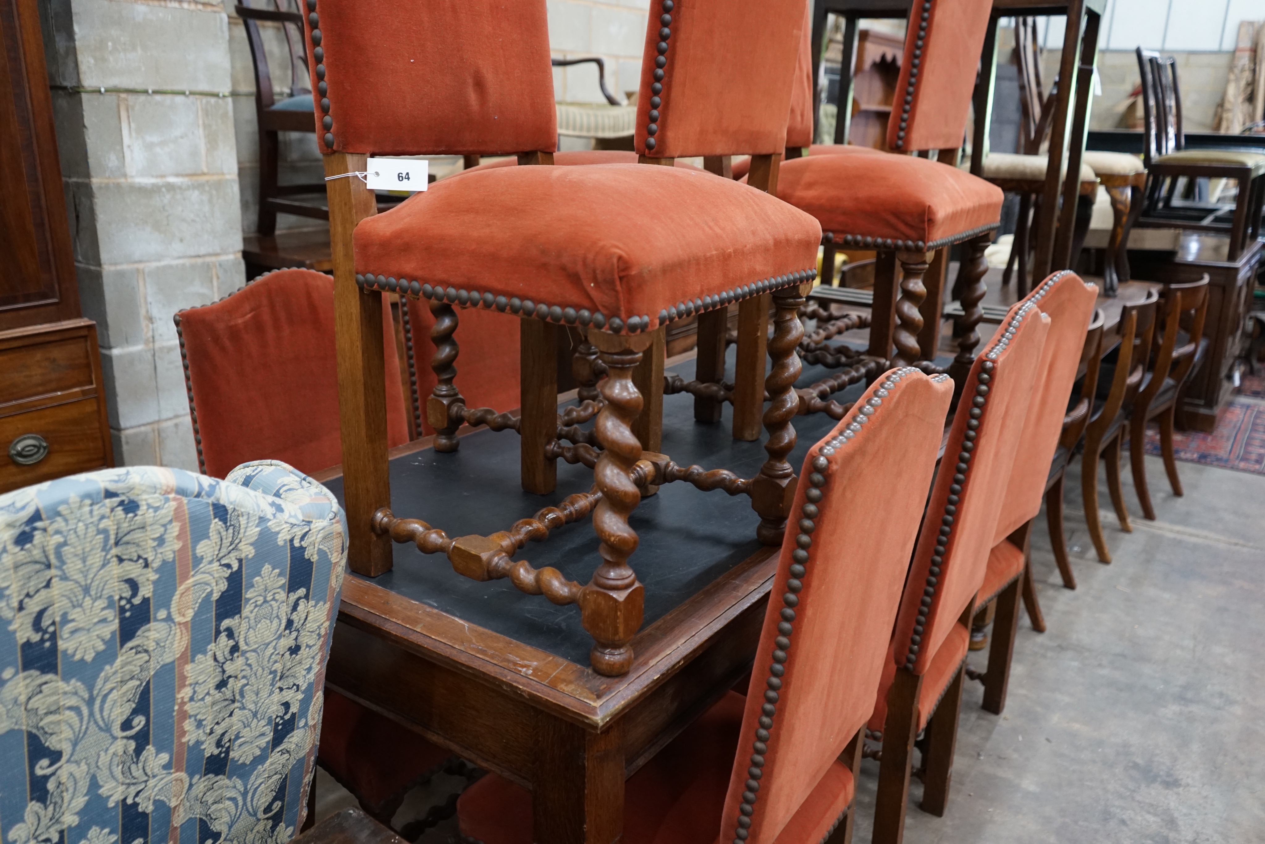 A set of ten Carolean design upholstered oak dining chairs